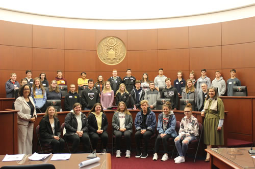 McGraw High School and Tully High School students, with Chief United States Bankruptcy Judge Margaret Cangilos-Ruiz and United States Magistrate Judge Therese Wiley Dancks